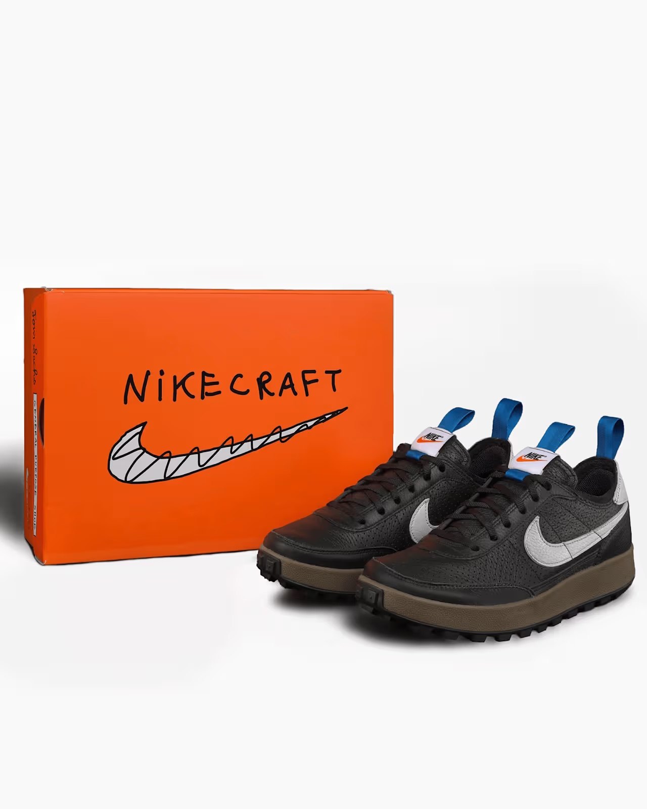 NIKECRAFTの手書きロゴが入ったオレンジのシューズボックス